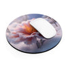 Flower Bloom in the Snow Round Mouse Pad.